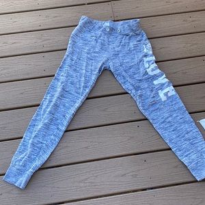 I am selling gray sweatpants that say love in white on the side.